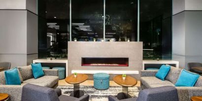 Lobby lounge with fireplace at Sonesta Columbus Downtown.