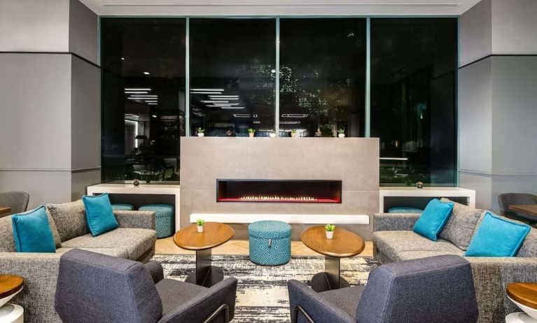 Lobby lounge with fireplace at Sonesta Columbus Downtown.