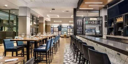 Dining area with comfortable seating at Sonesta Columbus Downtown.