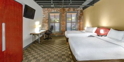 Bright and spacious day use twin room with work desk at Sonesta Columbus Downtown.