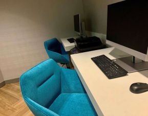 Business center with computers, printer and ergonomic chairs at Sonesta Columbus Downtown.