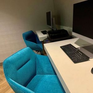 Business center with computers, printer and ergonomic chairs at Sonesta Columbus Downtown.