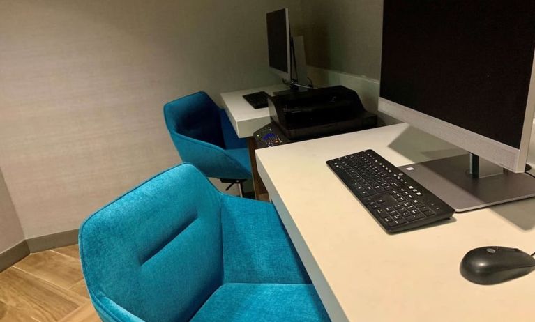 Business center with computers, printer and ergonomic chairs at Sonesta Columbus Downtown.