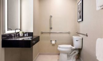 Private guest bathroom with shower at The Shelburne Sonesta New York.