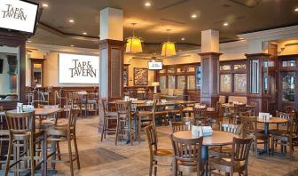 Dining area perfect for coworking at Embassy Suites By Hilton San Francisco Airport Waterfront.