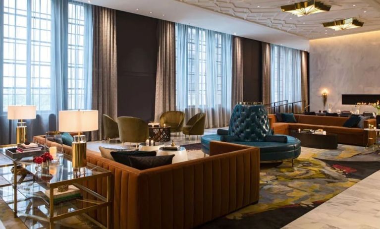 Comfortable and stylish lobby lounge with fireplace at The Allegro Royal Sonesta Hotel Chicago Loop.