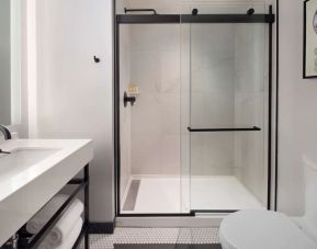 Private guest bathroom with shower at The Clift Royal Sonesta.