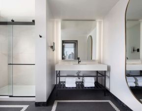 Private guest bathroom with shower at The Clift Royal Sonesta.