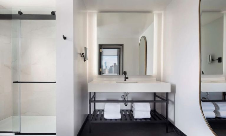 Private guest bathroom with shower at The Clift Royal Sonesta.