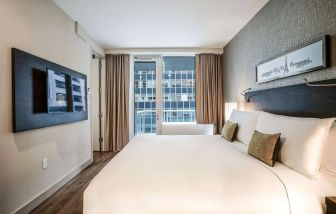 Day use room with balcony at The Bernic Hotel New York City, Tapestry Collection By Hilton.