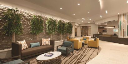 Lobby and coworking lounge at Hyatt Place West End Georgetown.