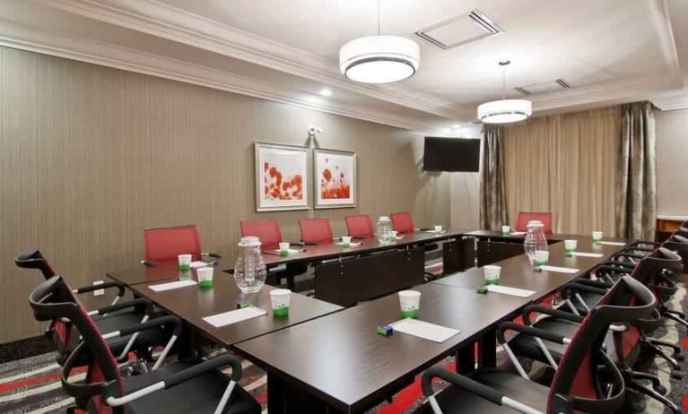 Comfortable meeting room suitable for small groups at the Hampton Inn & Suites by Hilton Toronto Markham.