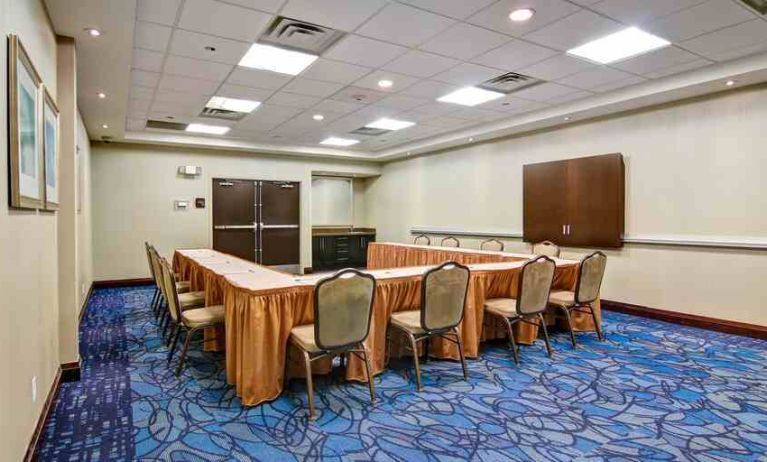 Small meeting room suitable for any business appointment at the Homewood Suites by Hilton Toronto-Markham.