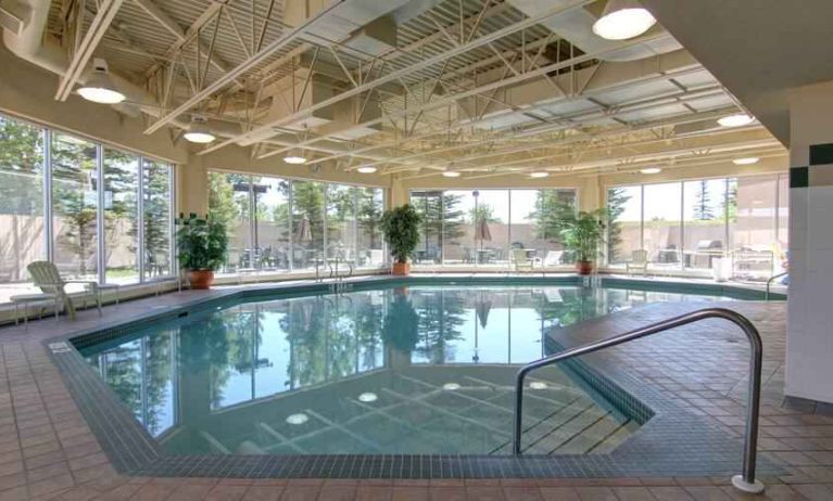 Bright indoor pool area at the Hilton Garden Inn Calgary Airport.