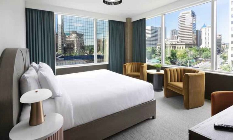 King room with corner city view at the Westley Calgary Downtown, Tapestry Collection by Hilton.