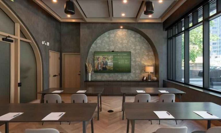 Comfortable meeting room suitable for any business appointment at the Westley Calgary Downtown, Tapestry Collection by Hilton.