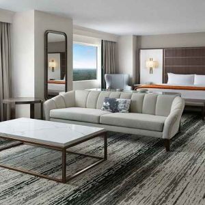 Spacious, bright and stylish living room in a presidential suite at the Signia by Hilton Orlando Bonnet Creek.