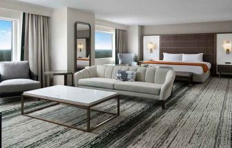 Spacious, bright and stylish living room in a presidential suite at the Signia by Hilton Orlando Bonnet Creek.