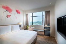 Comfortable queen guest room at the Hilton Garden Inn Kuala Lumpur Jalan Tuanku Abdul Rahman South.