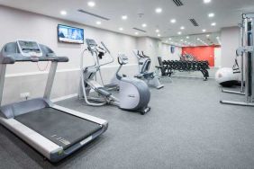 Fitness center with treadmill, exercising bike and weights at the Hilton Garden Inn Kuala Lumpur Jalan Tuanku Abdul Rahman North.