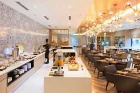 Elegant restaurant area with buffet at the Hilton Garden Inn Kuala Lumpur Jalan Tuanku Abdul Rahman North.