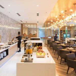 Elegant restaurant area with buffet at the Hilton Garden Inn Kuala Lumpur Jalan Tuanku Abdul Rahman North.