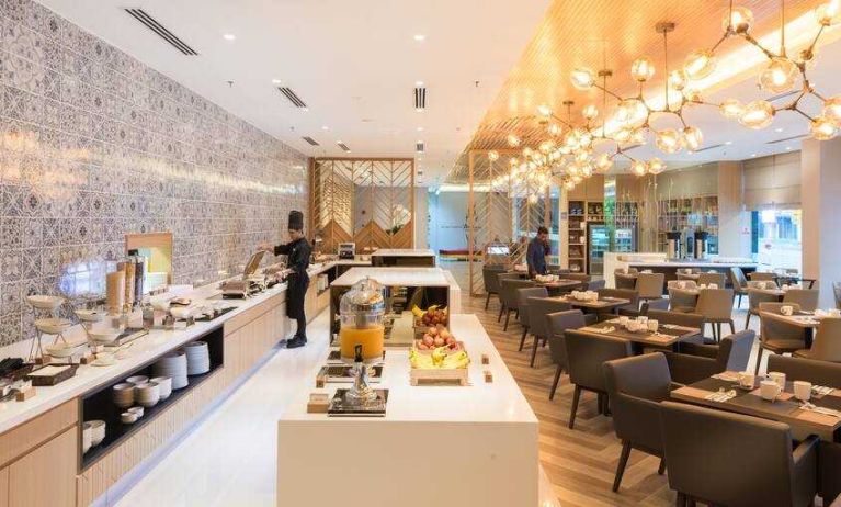 Elegant restaurant area with buffet at the Hilton Garden Inn Kuala Lumpur Jalan Tuanku Abdul Rahman North.