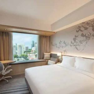 King size bed in a deluxe room with great city view at the Hilton Garden Inn Singapore Serangoon.