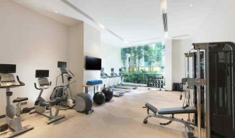 Fully equipped fitness center with treadmills and weights at the Hilton Garden Inn Singapore Serangoon.