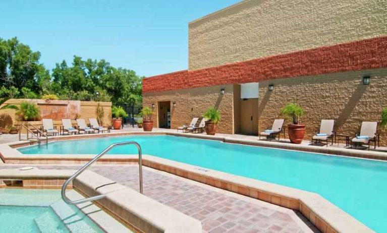 Relaxing outdoor pool area with at the Hilton Orlando-Altamonte Springs.