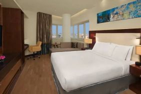 Spacious King sized room with king bed with private balcony at the DoubleTree by Hilton Hotel and Residences Dubai Al Barsha