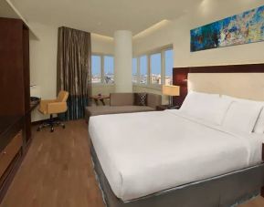 Spacious King sized room with king bed with private balcony at the DoubleTree by Hilton Hotel and Residences Dubai Al Barsha