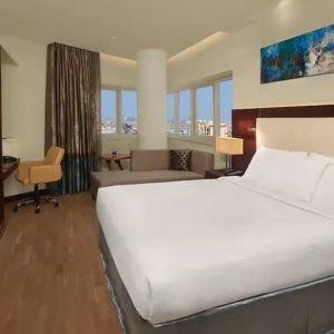 Spacious King sized room with king bed with private balcony at the DoubleTree by Hilton Hotel and Residences Dubai Al Barsha