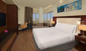 Spacious King sized room with king bed with private balcony at the DoubleTree by Hilton Hotel and Residences Dubai Al Barsha