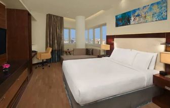 Spacious King sized room with king bed with private balcony at the DoubleTree by Hilton Hotel and Residences Dubai Al Barsha