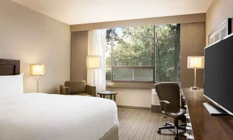 Comfortable deluxe queen room with window view at the Double Tree Toronto Airport West.