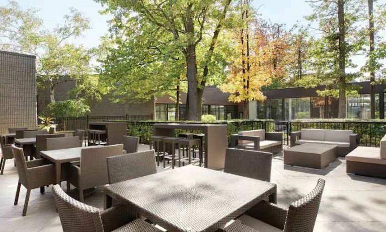 Beautiful workspace with plants and comfortable seating at the Double Tree Toronto Airport West.