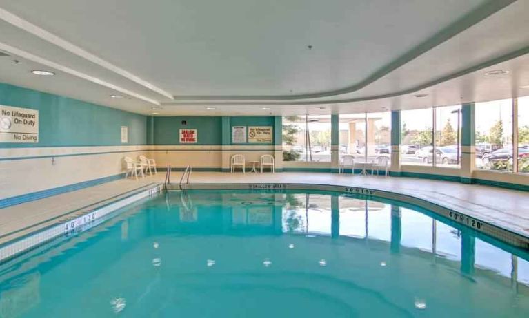 Bright and relaxing indoor pool area at the Hampton Inn by Hilton Toronto Airport Corporate Centre.