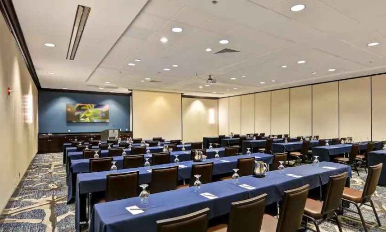 Meeting room with classroom set up at the Embassy Suites by Hilton Orlando-Downtown.