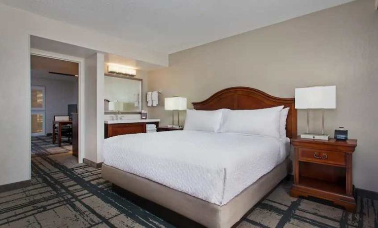 Comfortable room with king bed at the Embassy Suites by Hilton Orlando-International Drive Convention Center.