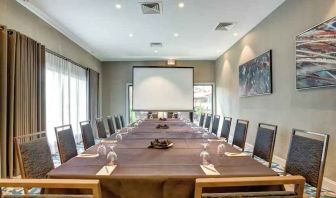 Small meeting room suitable for any business appointment at the Embassy Suites by Hilton Orlando International Drive Convention Center.