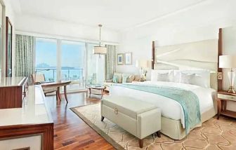 Bright and comfortable king room with sea view at the Waldorf Astoria Dubai Palm Jumeirah.