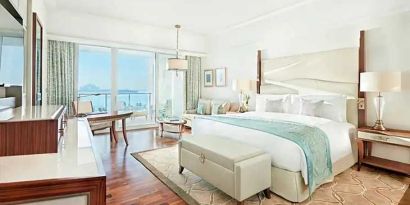 Bright and comfortable king room with sea view at the Waldorf Astoria Dubai Palm Jumeirah.