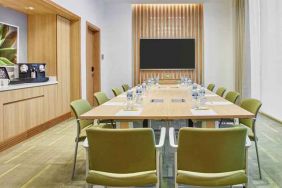 Meeting room with square conference table at the Hilton Garden Inn Dubai Mall of the Emirates.