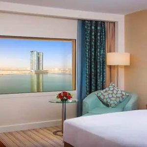 Bright queen room with amazing creek view at the Hilton Ras Al Khaimah Beach Resort.