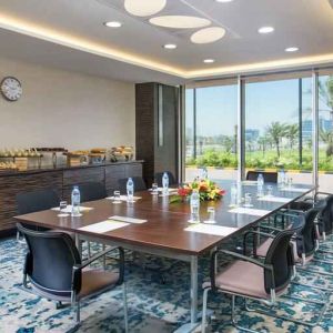 Bright meeting room perfect for small groups at the Hilton Ras Al Khaimah Beach Resort.