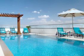 Beautiful outdoor pool at the Hilton Garden Inn Dubai Al Muraqabat