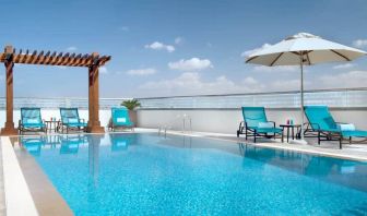 Beautiful outdoor pool at the Hilton Garden Inn Dubai Al Muraqabat