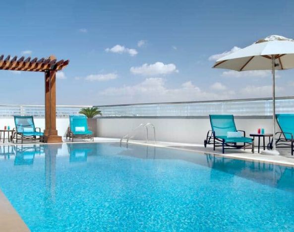 Beautiful outdoor pool at the Hilton Garden Inn Dubai Al Muraqabat