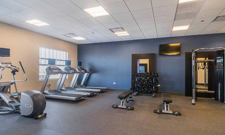 Well-equipped fitness center at Hampton Inn Chicago North-Loyola Station.